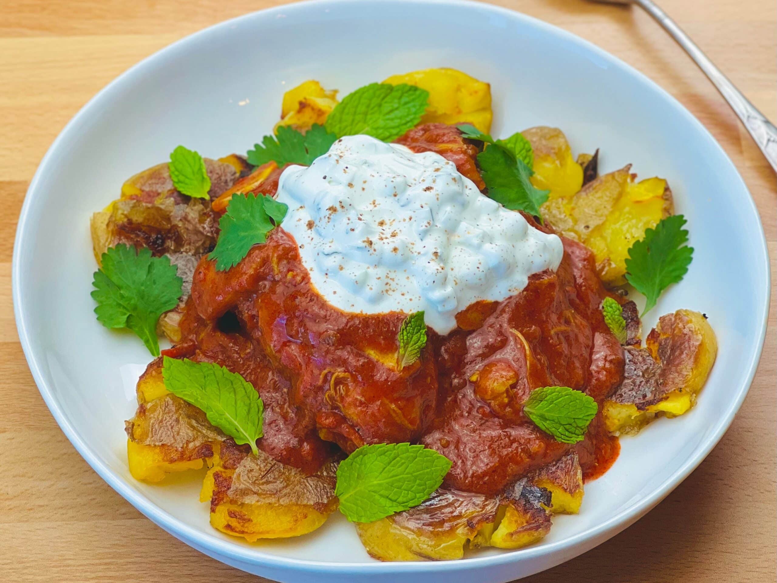 Crispy Smashed Potatoes with Chicken Tikka Masala - Potato Goodness