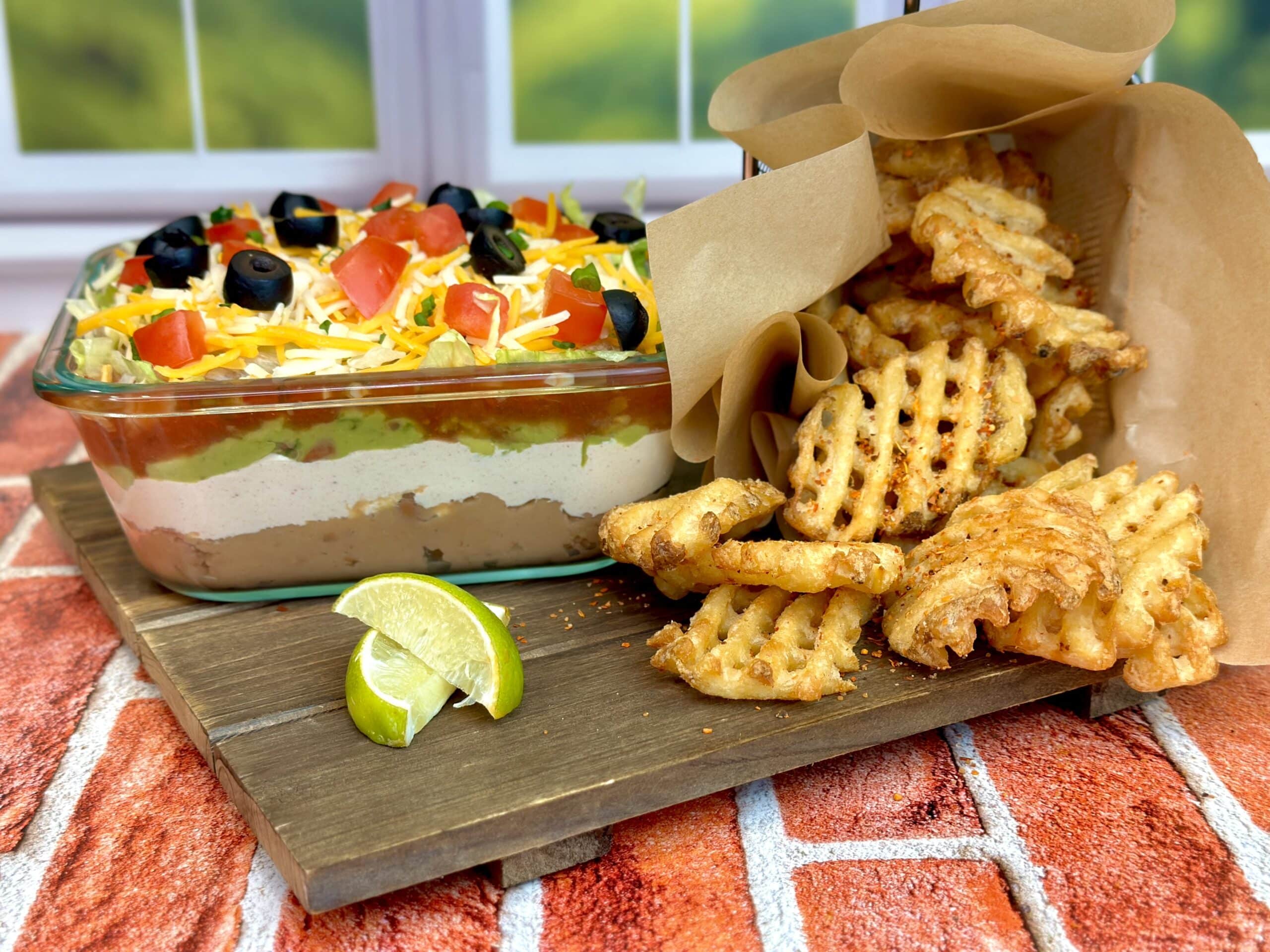 Taco Dip with Chili Lime Waffle Fries - Potato Goodness